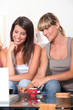 Young women browsing on the Internet