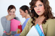 Photo: girl being mocked by fellow students girl being mocked by fellow students