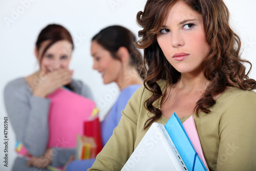 Photo: girl being mocked by fellow students girl being mocked by fellow students
