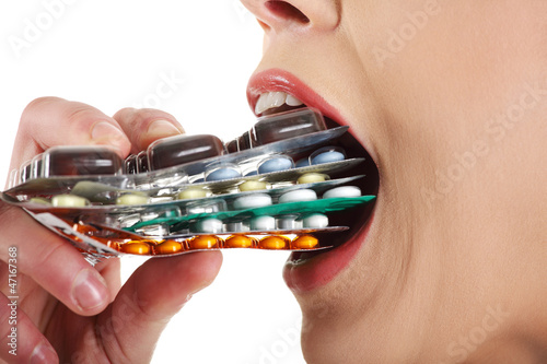 Photo: Young beautiful ill woman with pills. Young beautiful ill woman with pills.