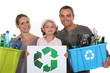 Family recycling bottles