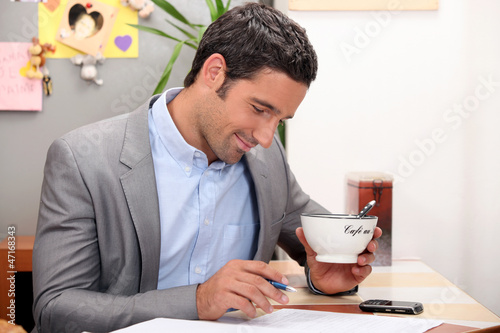 Photo: Business at home having coffee before work Business at home having coffee before work