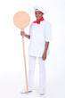 Pizza maker holding a pizza peel