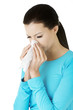 Young woman with tissue.