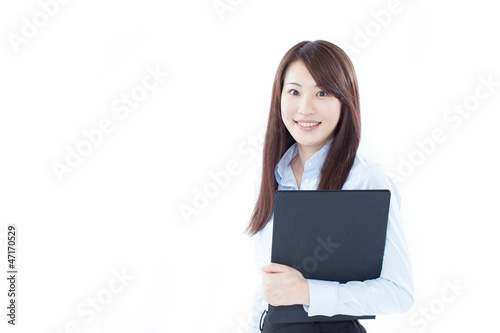 Photo: ファイルを持った女性 ファイルを持った女性