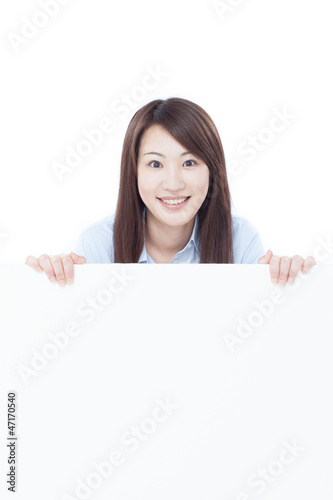 Photo: 看板を持った女性 看板を持った女性