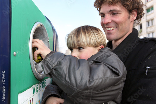 Photo: Father and son at a bottle bank Father and son at a bottle bank