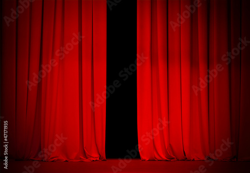 Photo: red curtain on theater or cinema stage slightly open red curtain on theater or cinema stage slightly open