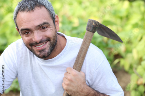 Photo: Man with hoe Man with hoe
