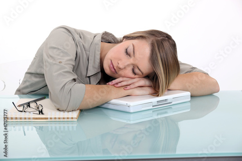 Photo: Businesswoman sleeping at work Businesswoman sleeping at work