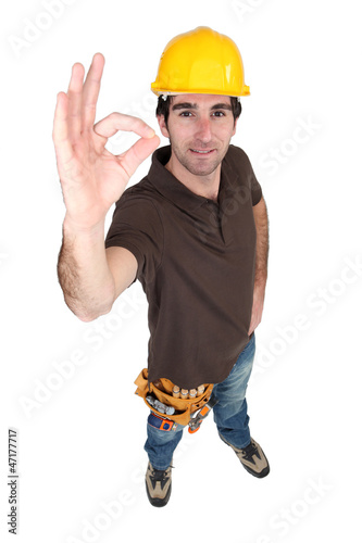 Photo: Satisfied building worker Satisfied building worker