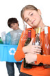 Photo: Children recycling glass bottles Children recycling glass bottles
