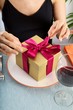 opening a golden gift package