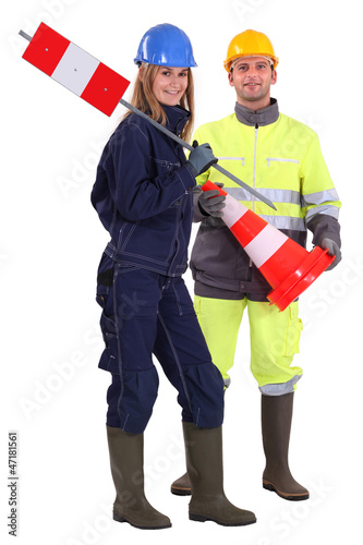 Photo: Male and female traffic workers Male and female traffic workers