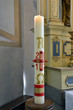 Foto: Osterkerze - Kerze - bei der Taufe - in der Kirche Osterkerze - Kerze - bei der Taufe - in der Kirche