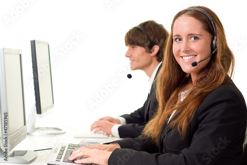 Photo: Junger weiblicher Call Center Agent Junger weiblicher Call Center Agent
