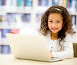 Girl using a laptop computer