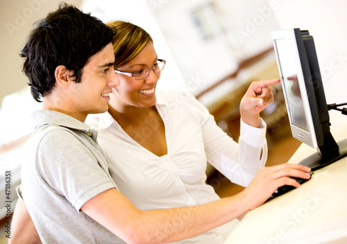 Photo: Students using a computer Students using a computer