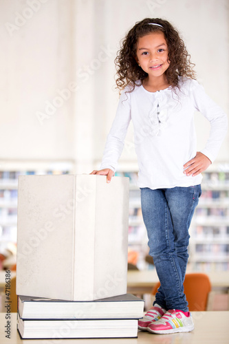 Photo: Happy girl at the library Happy girl at the library