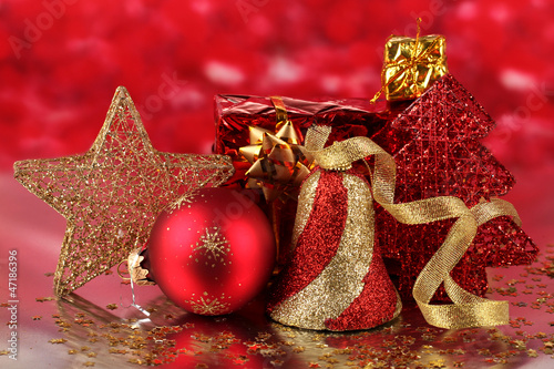 Photo: Christmas decoration on red background Christmas decoration on red background