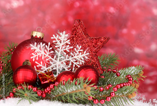 Photo: Christmas decoration on red background Christmas decoration on red background