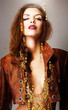 erotic woman with gold accessory