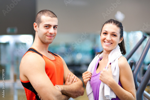 Photo: Fitness woman with a personal trainer Fitness woman with a personal trainer