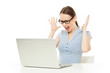 Photo: Female shocked at something on her computer Female shocked at something on her computer