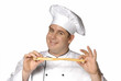 Foto: Un cocinero,chef probando pan.palillo de pan. Un cocinero,chef probando pan.palillo de pan.