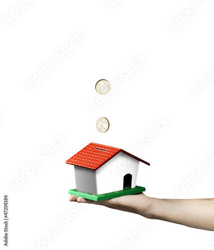 Photo: House and coins House and coins