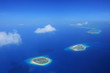Sun and clouds over islands in Laccadives sea, Maldives