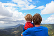 family looking at mountains of Mauritius