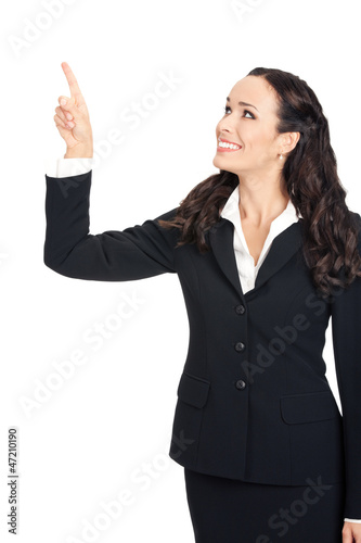 Photo: Business woman showing, isolated Business woman showing, isolated