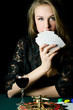 The beautiful girl with playing card
