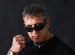 Photo: Tough guy threatening with fist Tough guy threatening with fist