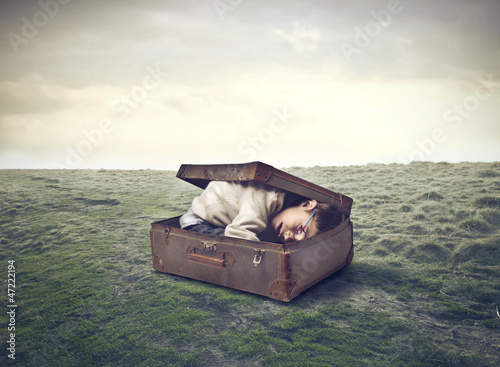 Photo: Child in the Suitcase Child in the Suitcase