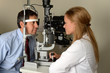 Young Eye Doctor with her patient