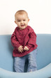 baby happy to be able to stand up