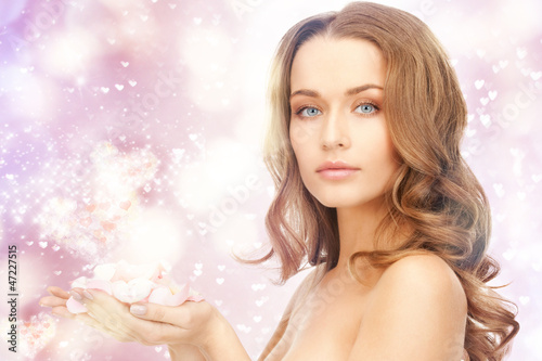 Photo: beautiful woman with rose petals beautiful woman with rose petals