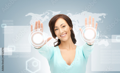 Photo: businesswoman working with touch screen businesswoman working with touch screen