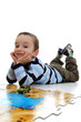 boy doing a jigsaw, puzzle
