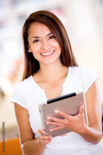 Photo: Student with a tablet computer Student with a tablet computer