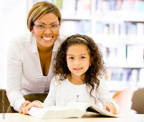 Photo: Teacher with a young student Teacher with a young student