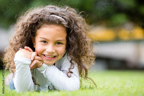Photo: Happy girl at the park Happy girl at the park