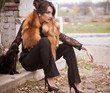 Photo: young woman in vintage fashion clothes with cat young woman in vintage fashion clothes with cat