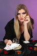 Photo: Witch - fortune teller on color background Witch - fortune teller on color background