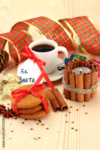 Photo: Cookies for Santa: Conceptual image of ginger cookies, milk and Cookies for Santa: Conceptual image of ginger cookies, milk and