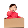 Adorable baby girl in a box