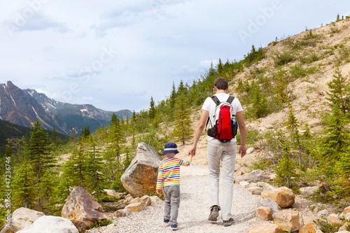 Photo: father and his son walking father and his son walking