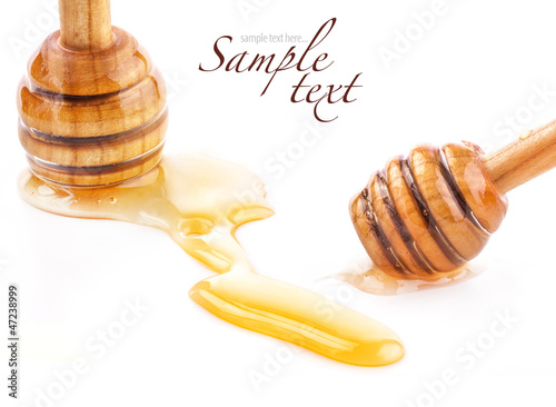 Photo: Wooden honey dipper and Honey drops Wooden honey dipper and Honey drops